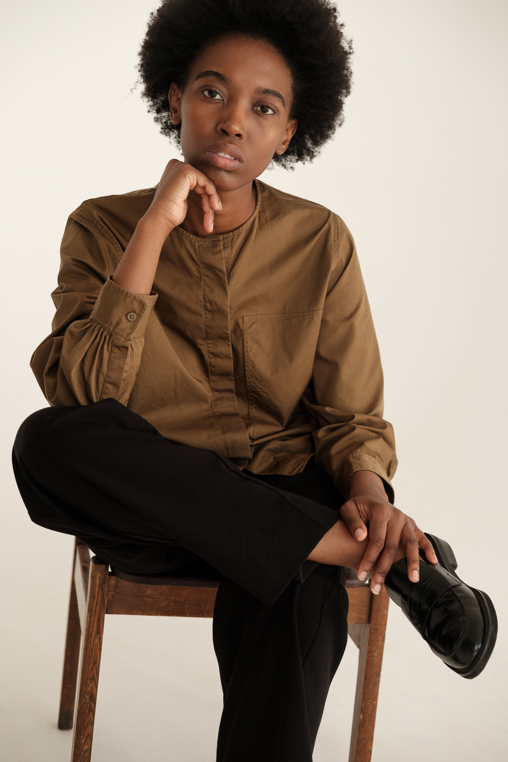 Woman in Brown Dress Shirt and Slacks